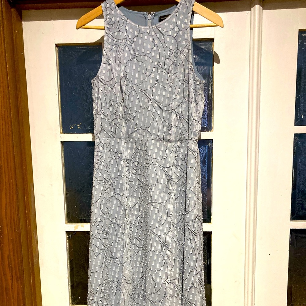 Light blue shiny floral desigh casual or formal dress.